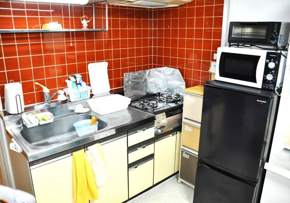 アイム北10条 Apartamento Sapporo Exterior foto